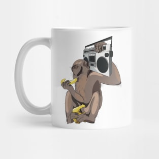 Funky monkey eating a banana listening to a boombox Mug